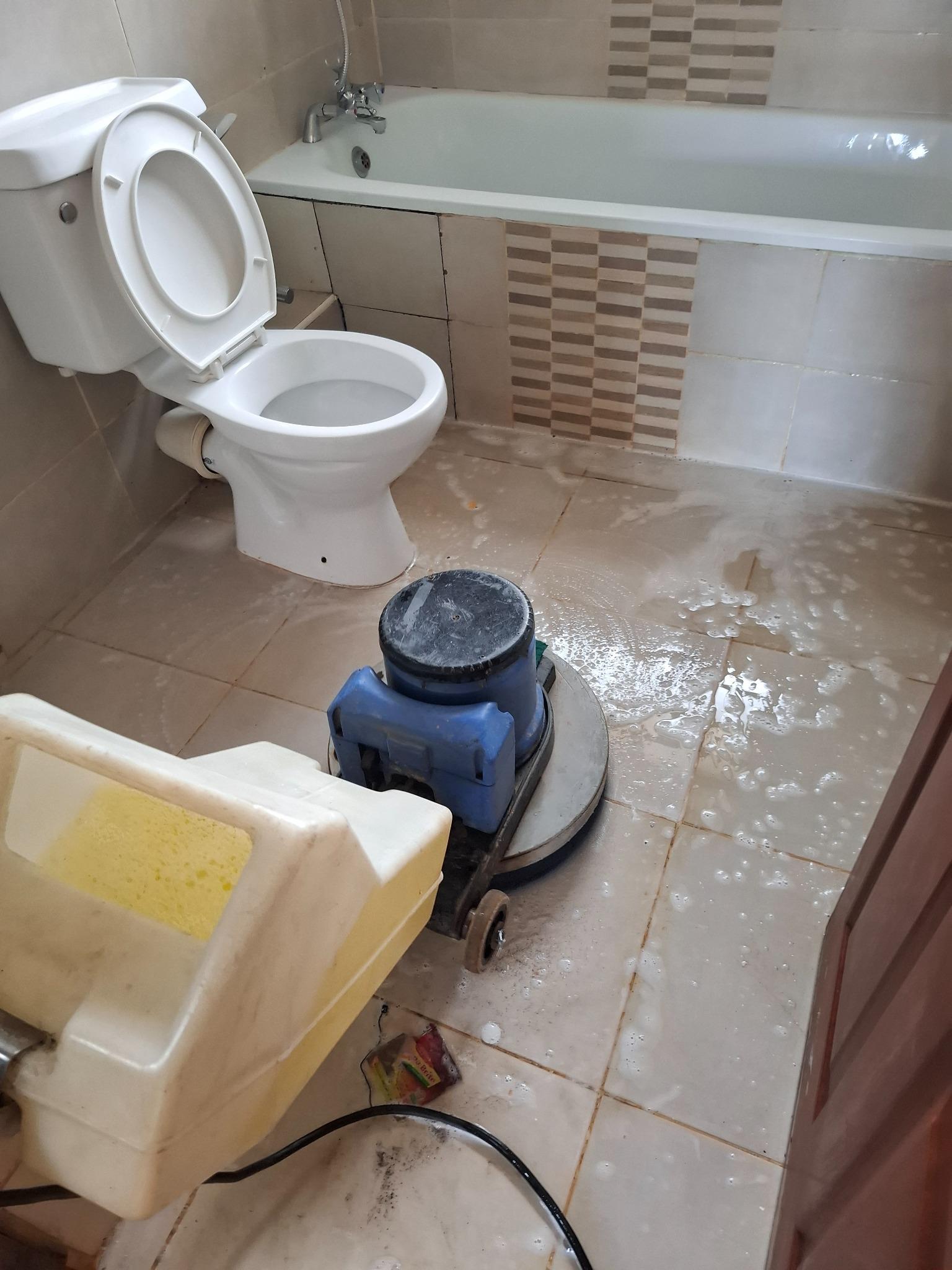 During cleaning: machine scrubbing suitable bathroom floor tiles.